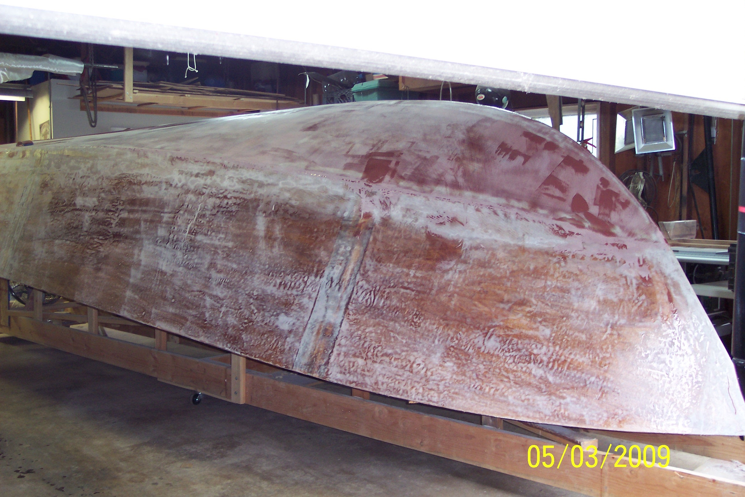 Hull exterior with reddish epoxy, May 2009