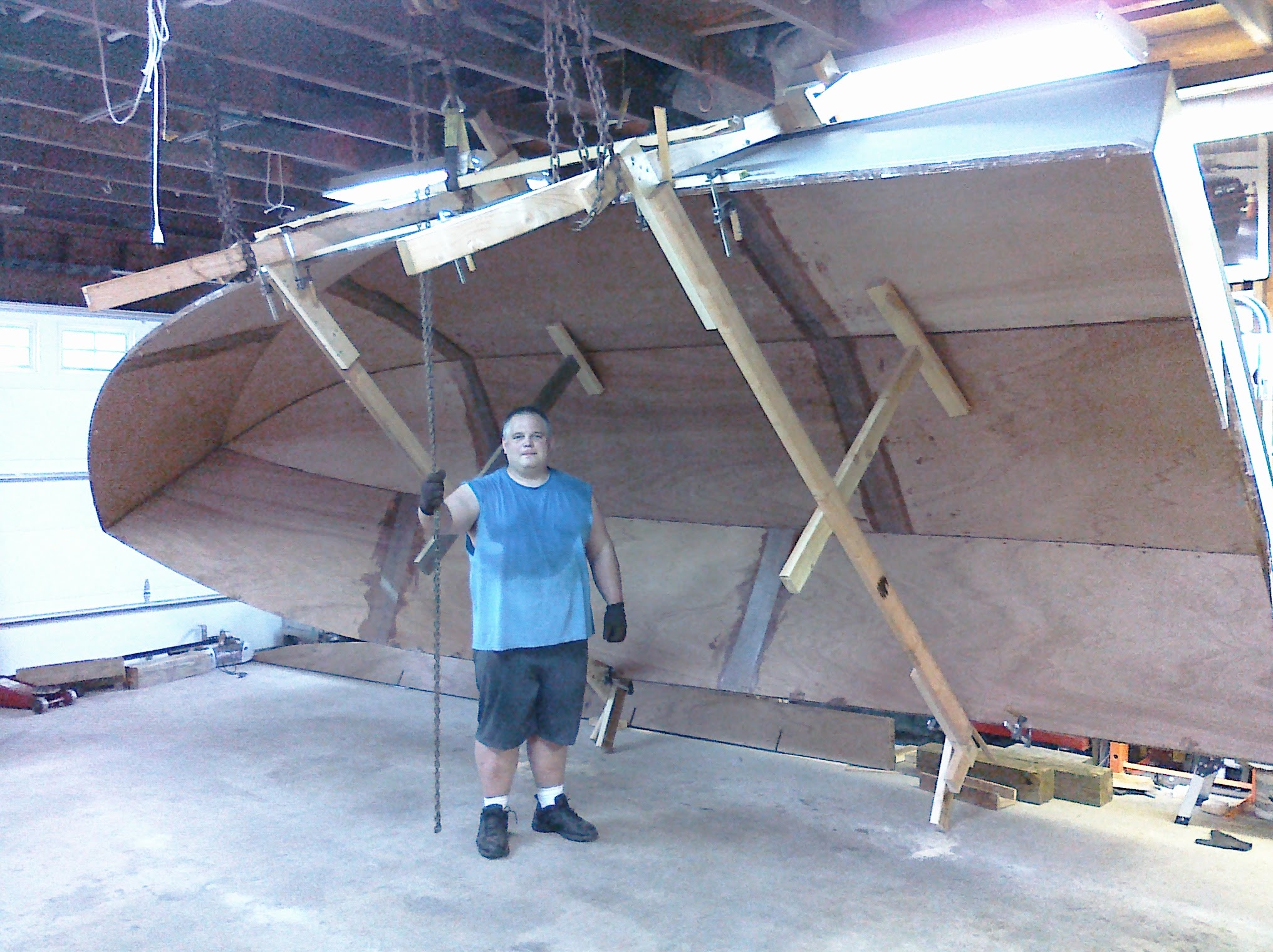 Chain hoist being used to flip the hull