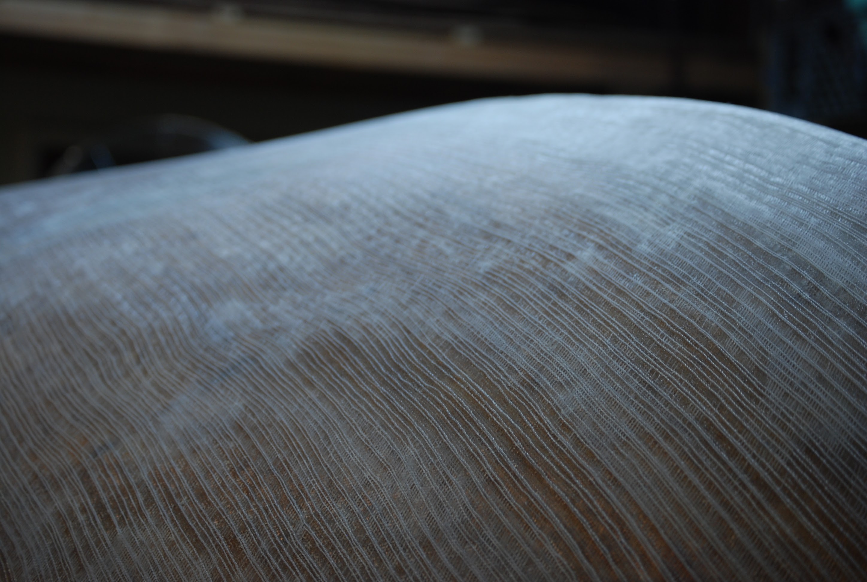 Close-up of fiberglass cloth texture on hull