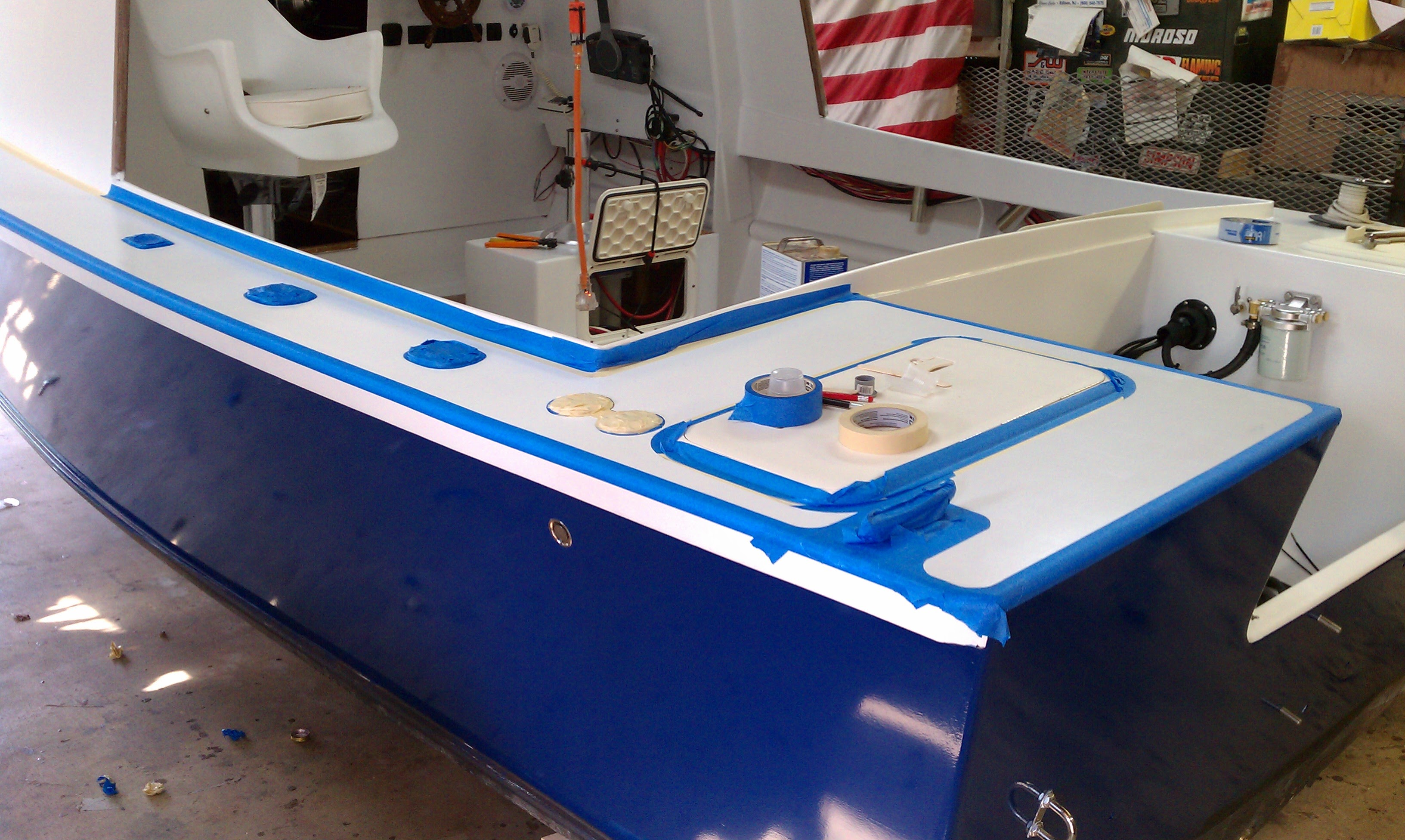 Blue paint complete with blue tape on waterline