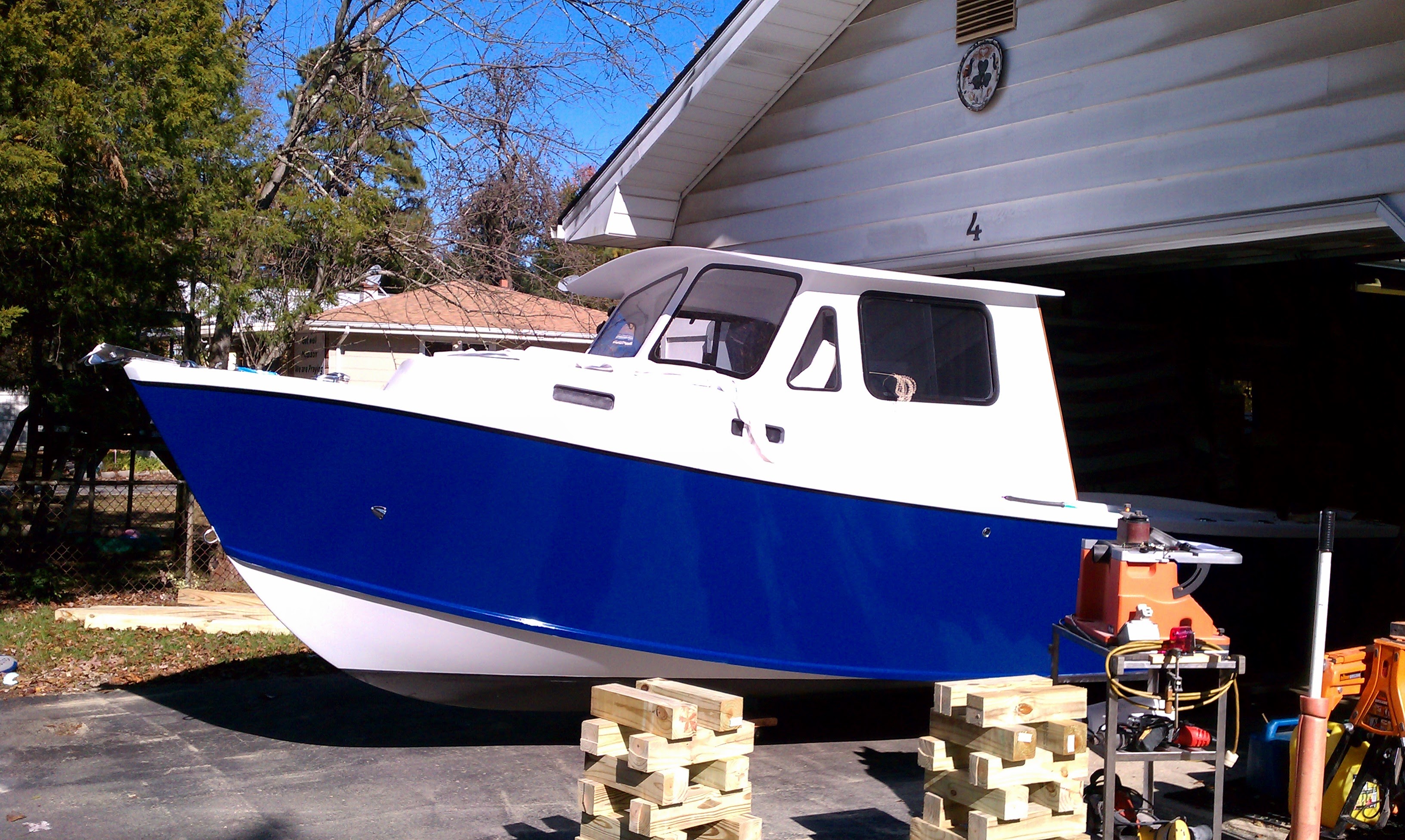 J-Marie fully out of the garage on timber in the driveway