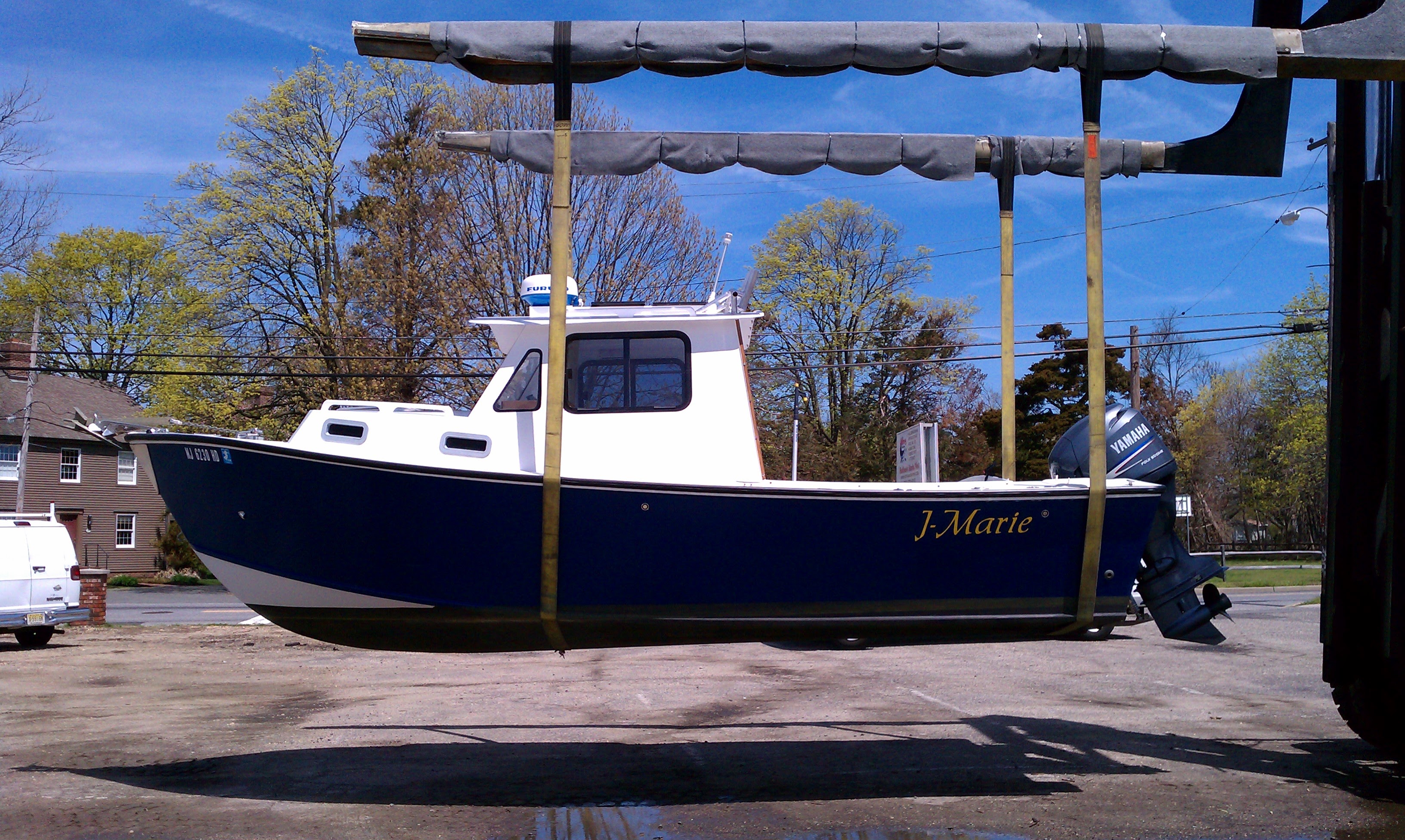 The J-Marie hanging in the travel lift slings on launch day