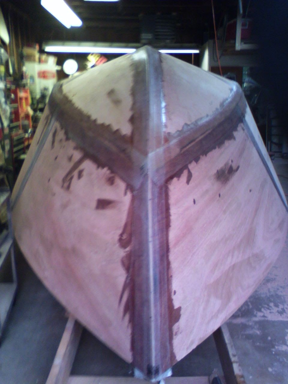 Bow view of hull in primer on cradle
