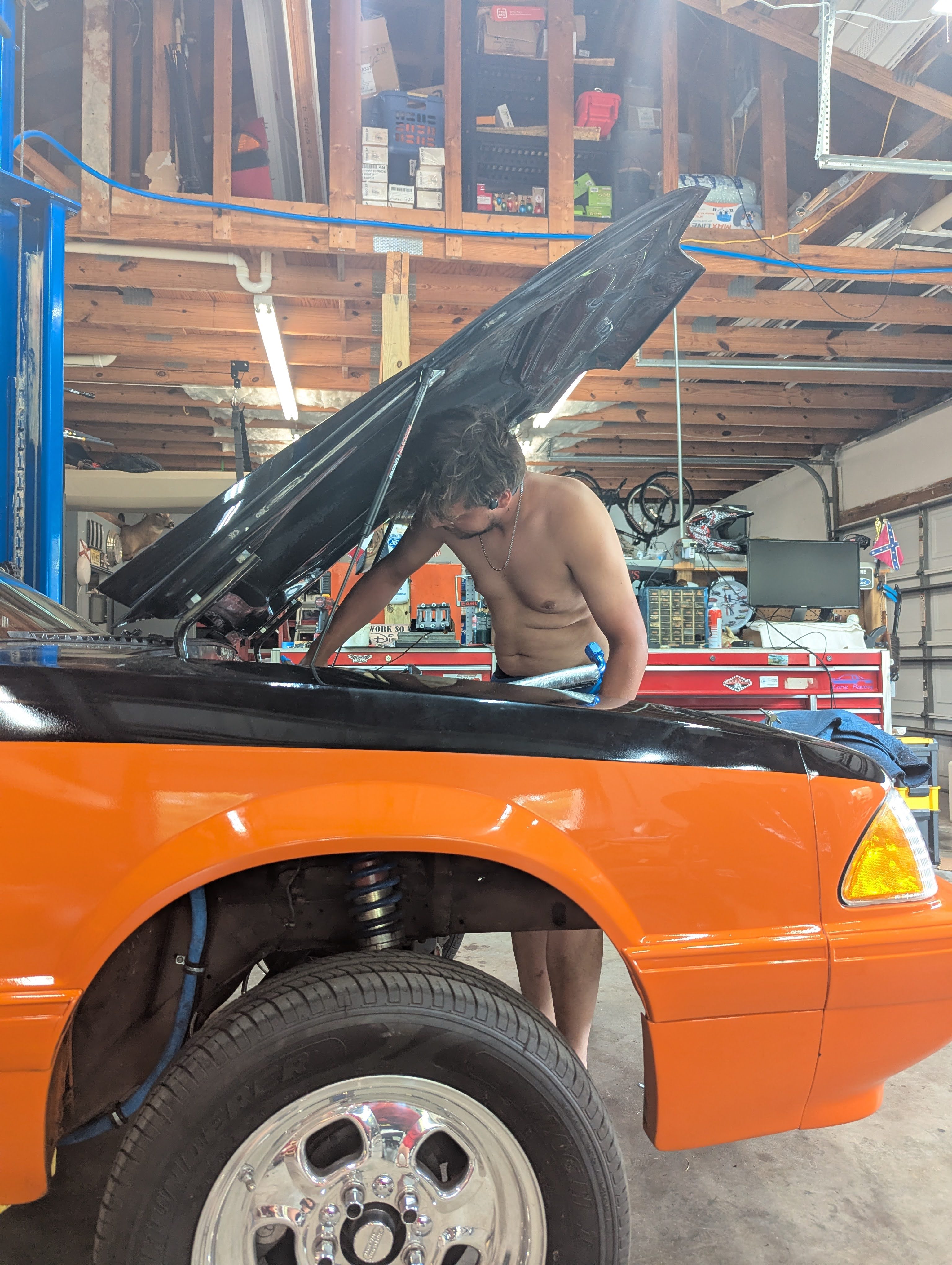 Dominic leaning into the 88 engine bay