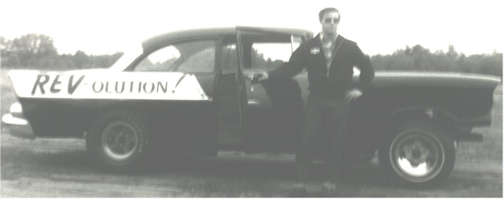 Lane Palmer Sr. with his REV-olution race car