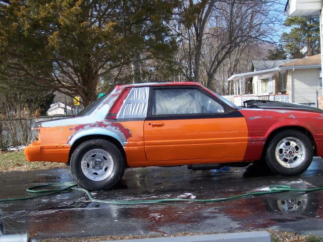 New roof grafted on, car being washed mid-rebuild